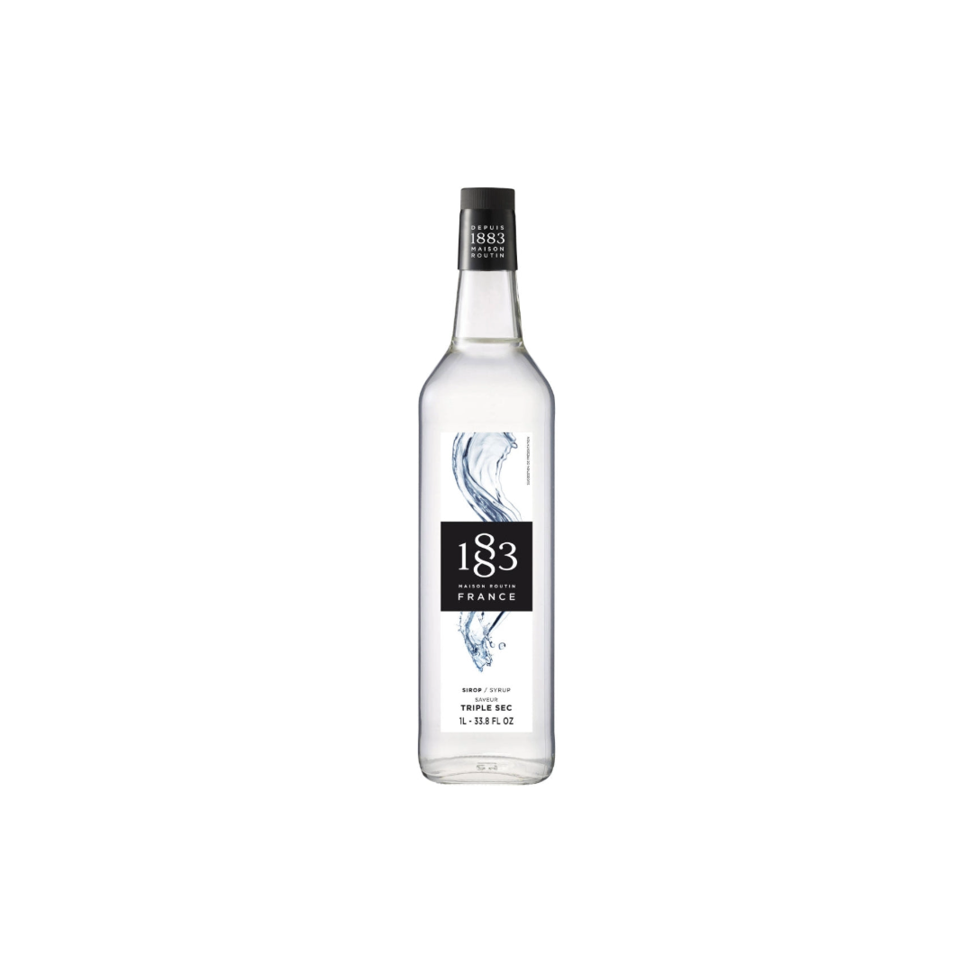 A slim glass bottle filled with clear syrup